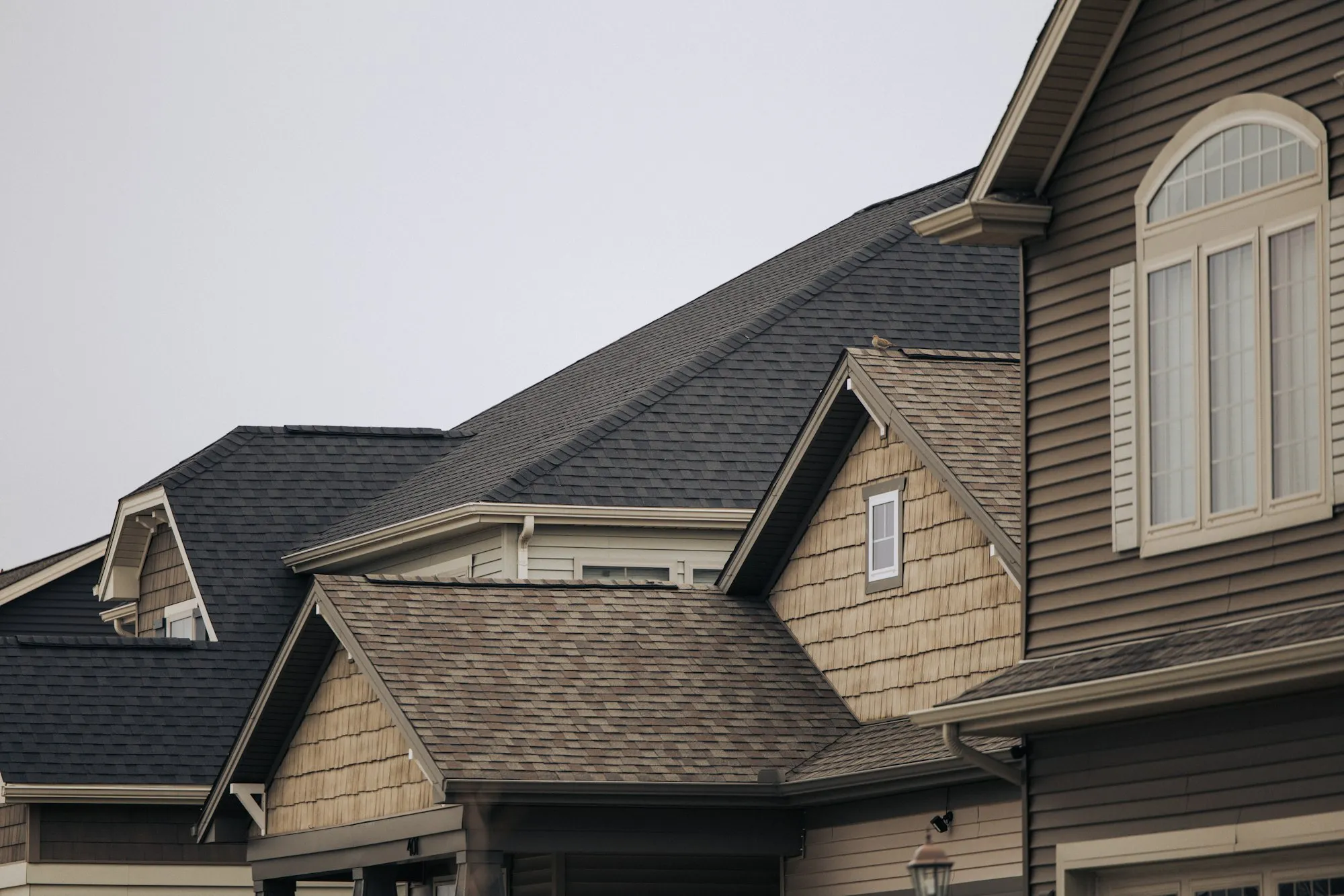 Newly installed architectural shingle roof on an upscale Omaha-area home